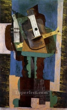 Guitarra clarinete y botella sobre una mesa 1916 cubismo Pablo Picasso Pinturas al óleo